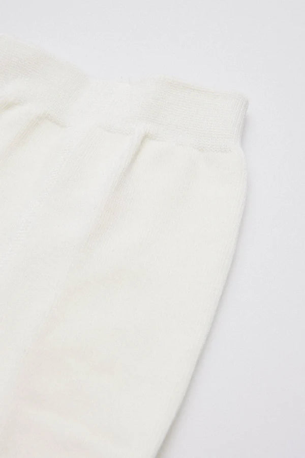 Leotardo infantil Marfil