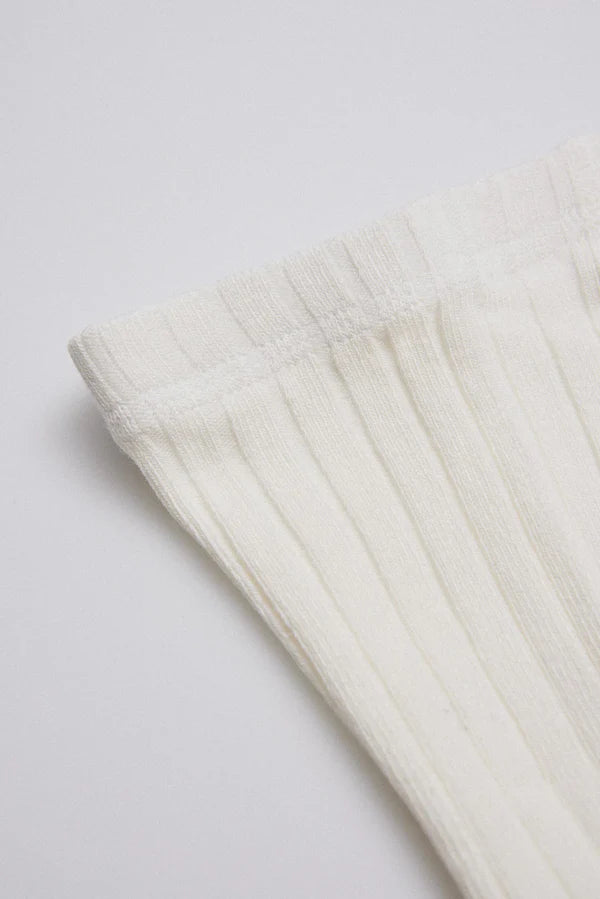 Leotardo bebé canalé Marfil