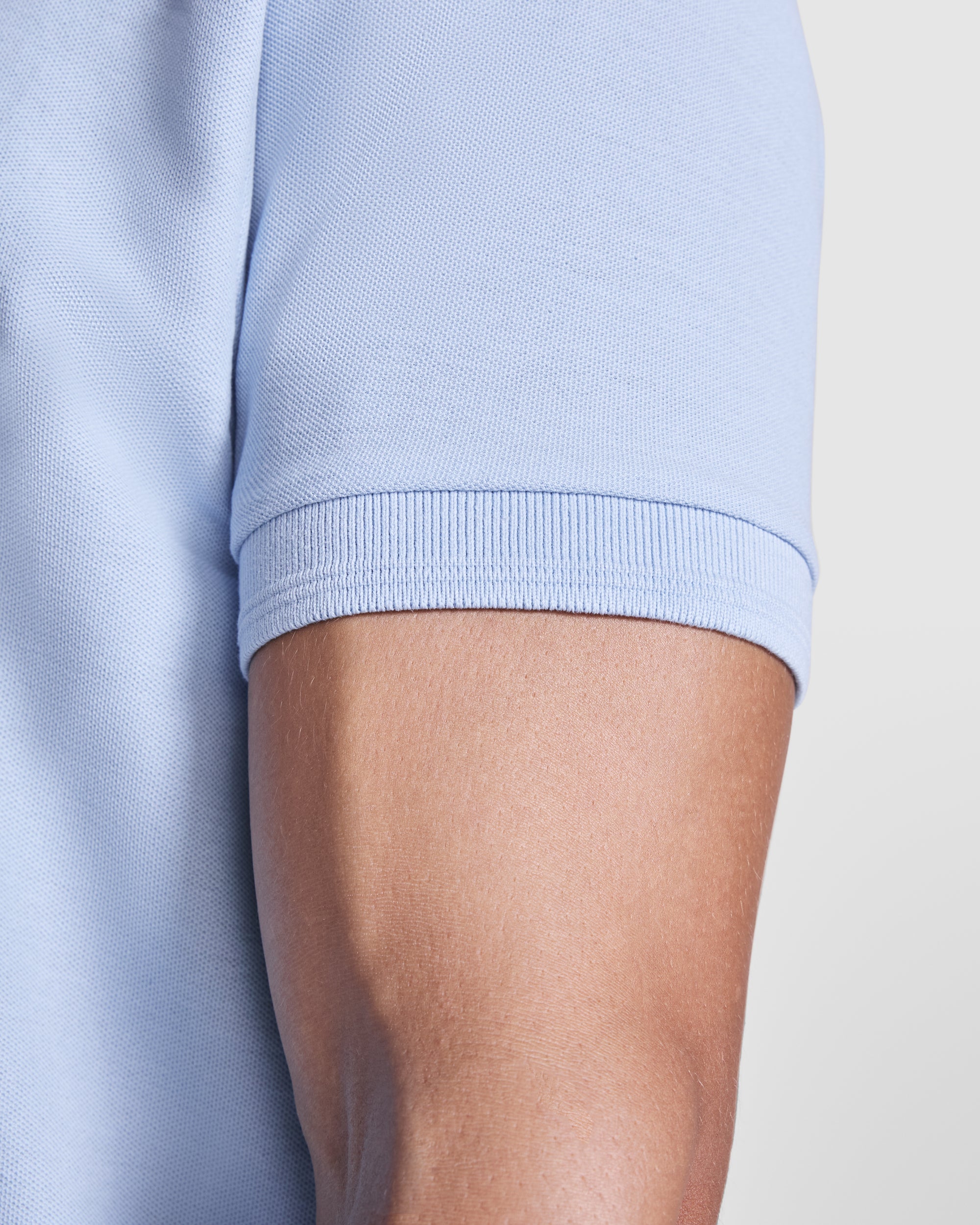 Polo infantil unisex manga corta celeste