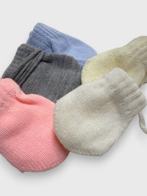 Manopla bebé primera puesta